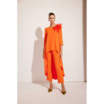 Conjunto de pantalón y casaca de fiesta color naranja