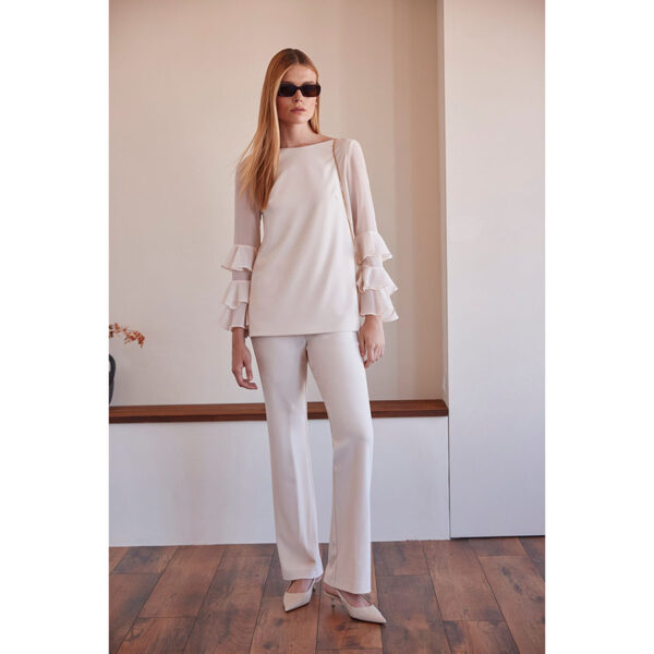 Conjunto de pantalón y top de fiesta en color blanco