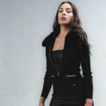 Chaqueta de punto en color negro con detalle de cremallera y cuellos de pelo desmontable
